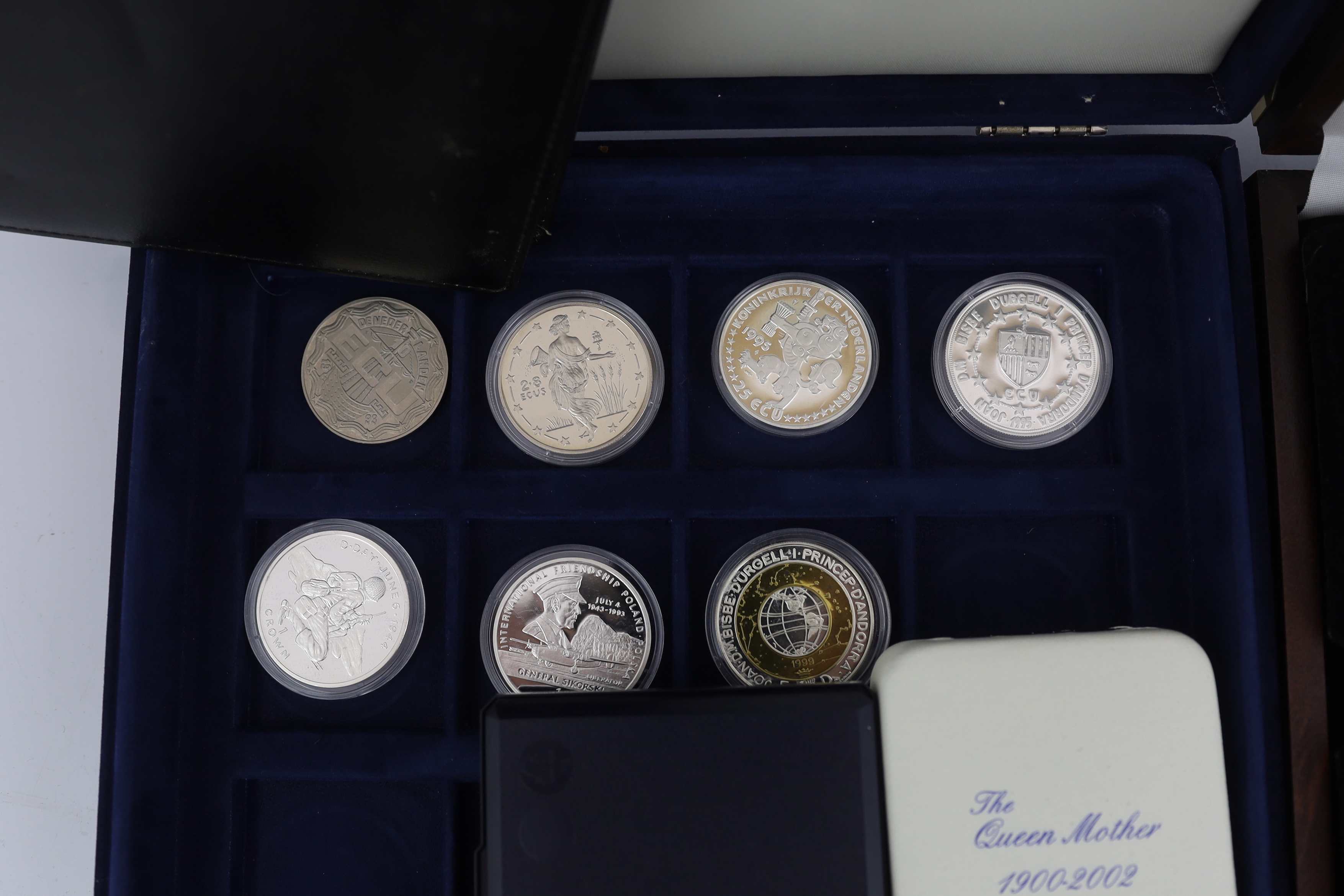QEII proof silver coins, and ECU coins, many commemorating the Queen mother including Georgia and South Sandwich Islands 2006 two pounds , Isle of Man 2006 one crown , Royal Australian Mint 2002 five dollars , Queen Eliz